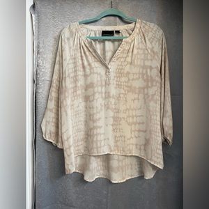 Women’s neutral colored blouse